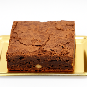 Brownie artesanal de chocolate elaborado en nuestro obrador Sucre en Santander. Textura jugosa, sabor intenso y puro placer en cada bocado